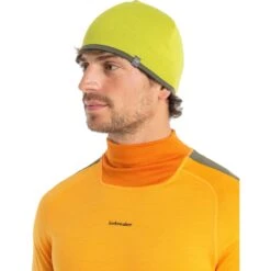 Icebreaker Pocket Omkeerbare Muts - Bio Lime/Loden -Icebreaker icebreaker pocket hat bio lime loden 1 1542047
